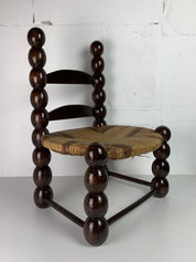 Brutalist_Wood_Turned_Bobbin_Low_Rush_Chair_from_Charles_Dudouyt,_France,_1950s