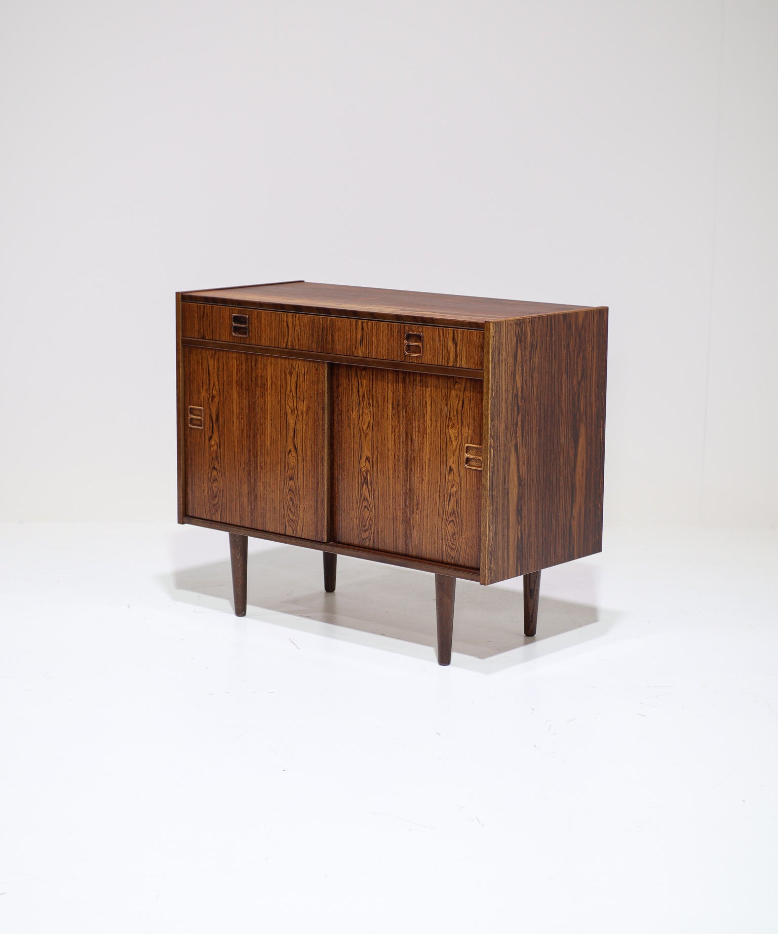 Cabinet_with_sliding_doors_and_drawer_Danish_vintage_rosewood