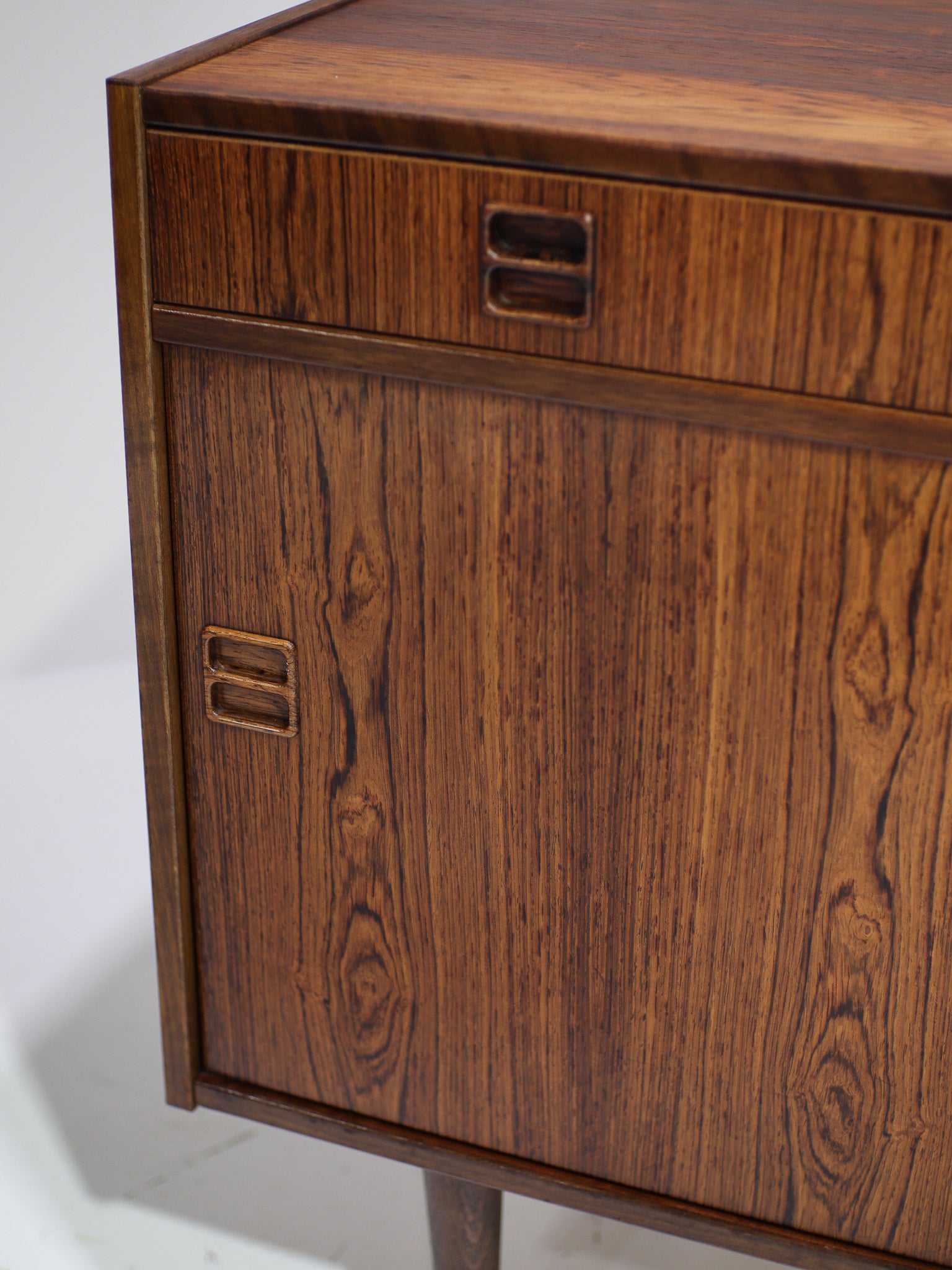 Cabinet_with_sliding_doors_and_drawer_Danish_vintage_rosewood