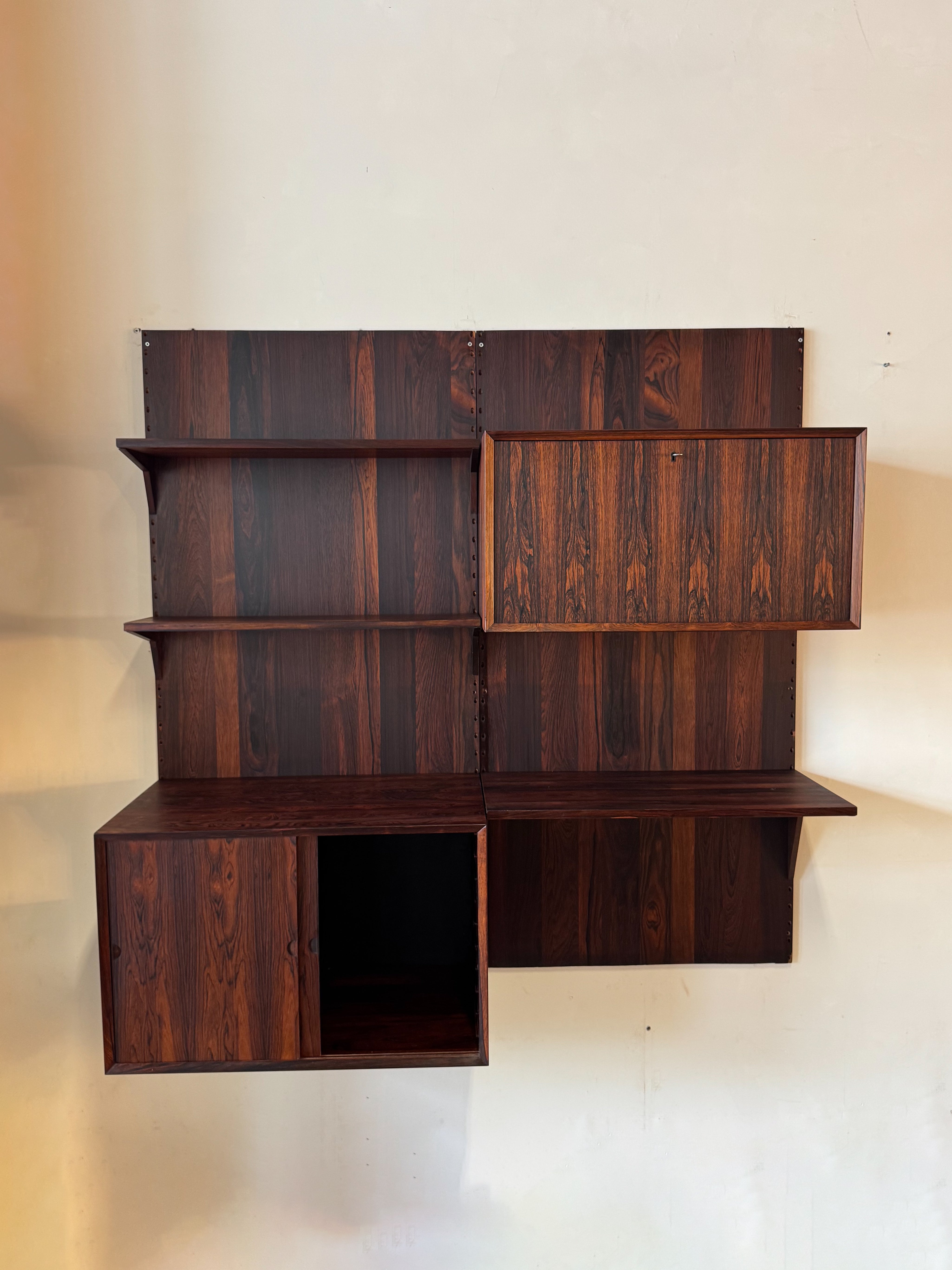 Cado_Rosewood_Wall_System_by_Poul_Cadovius,_Denmark,_1960s