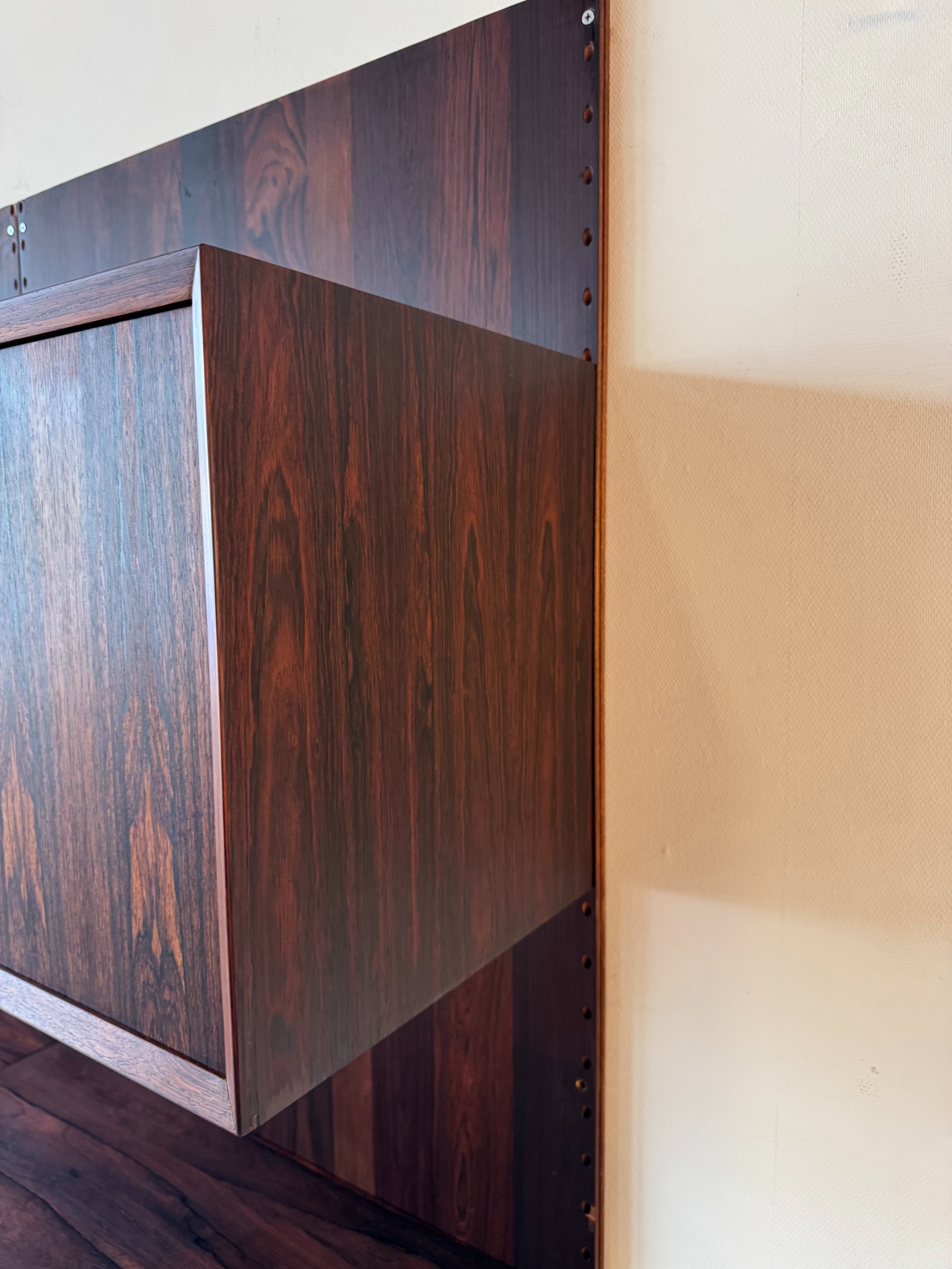 Cado_Rosewood_Wall_System_by_Poul_Cadovius,_Denmark,_1960s
