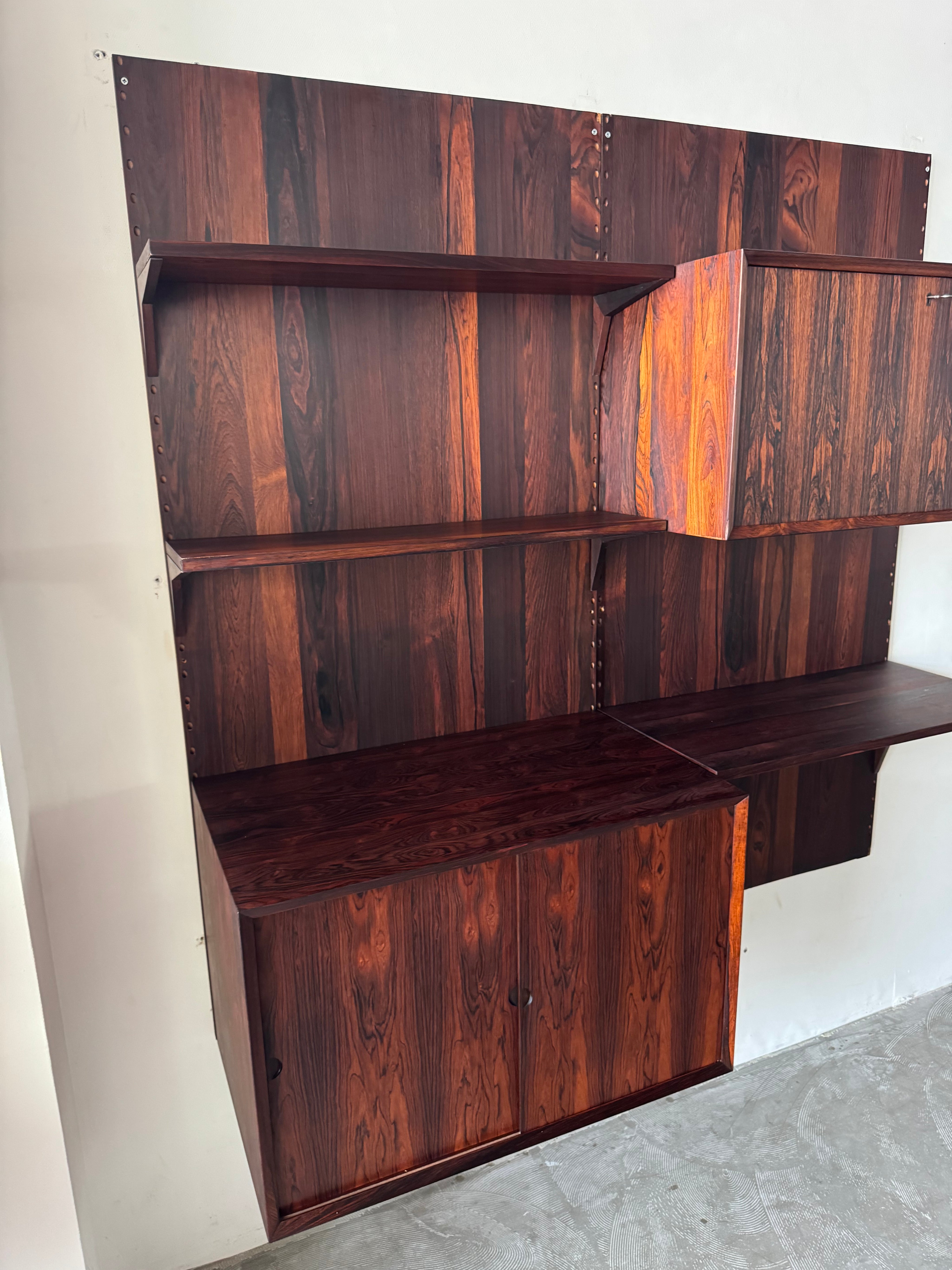 Cado_Rosewood_Wall_System_by_Poul_Cadovius,_Denmark,_1960s