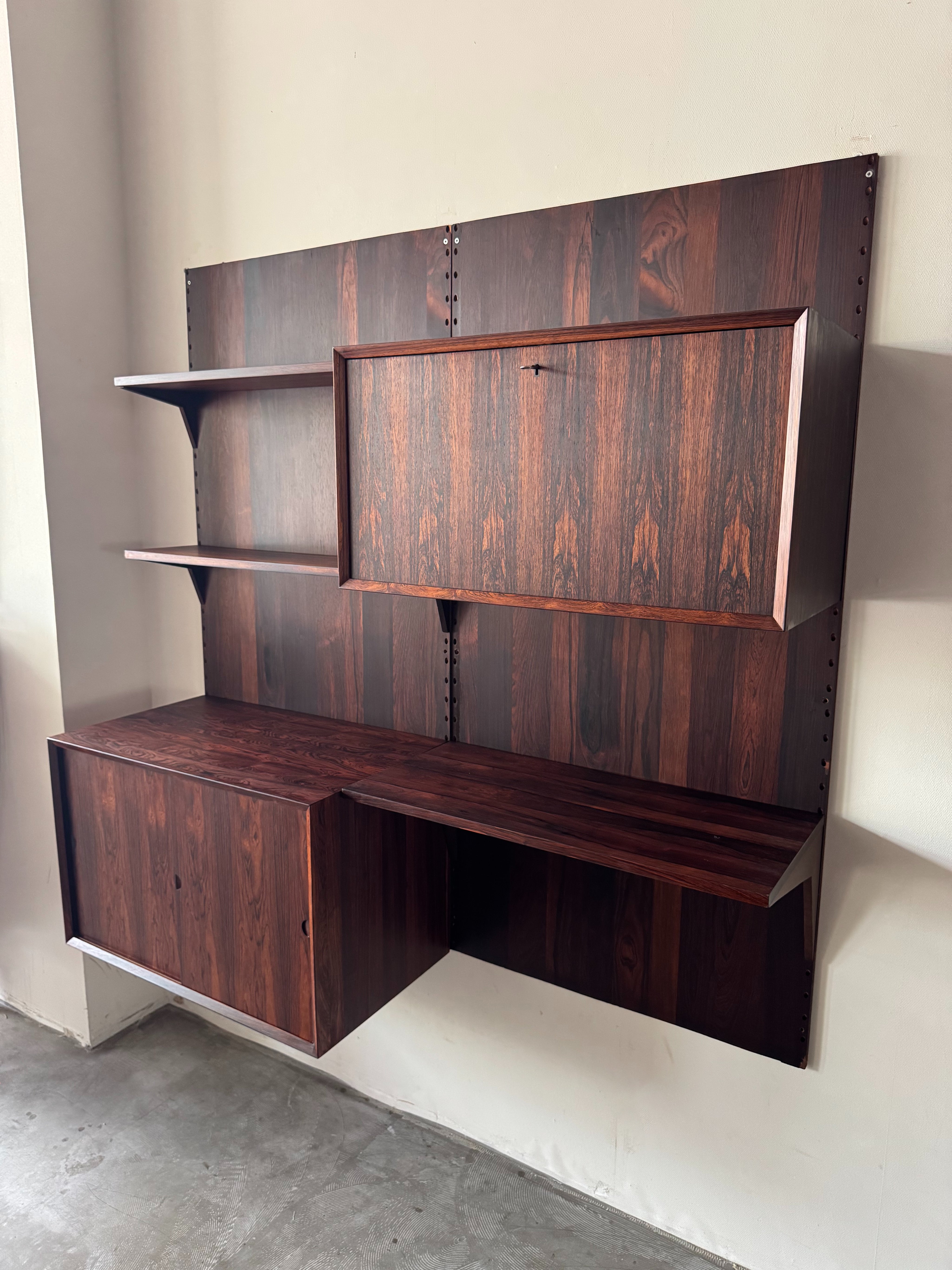 Cado_Rosewood_Wall_System_by_Poul_Cadovius,_Denmark,_1960s