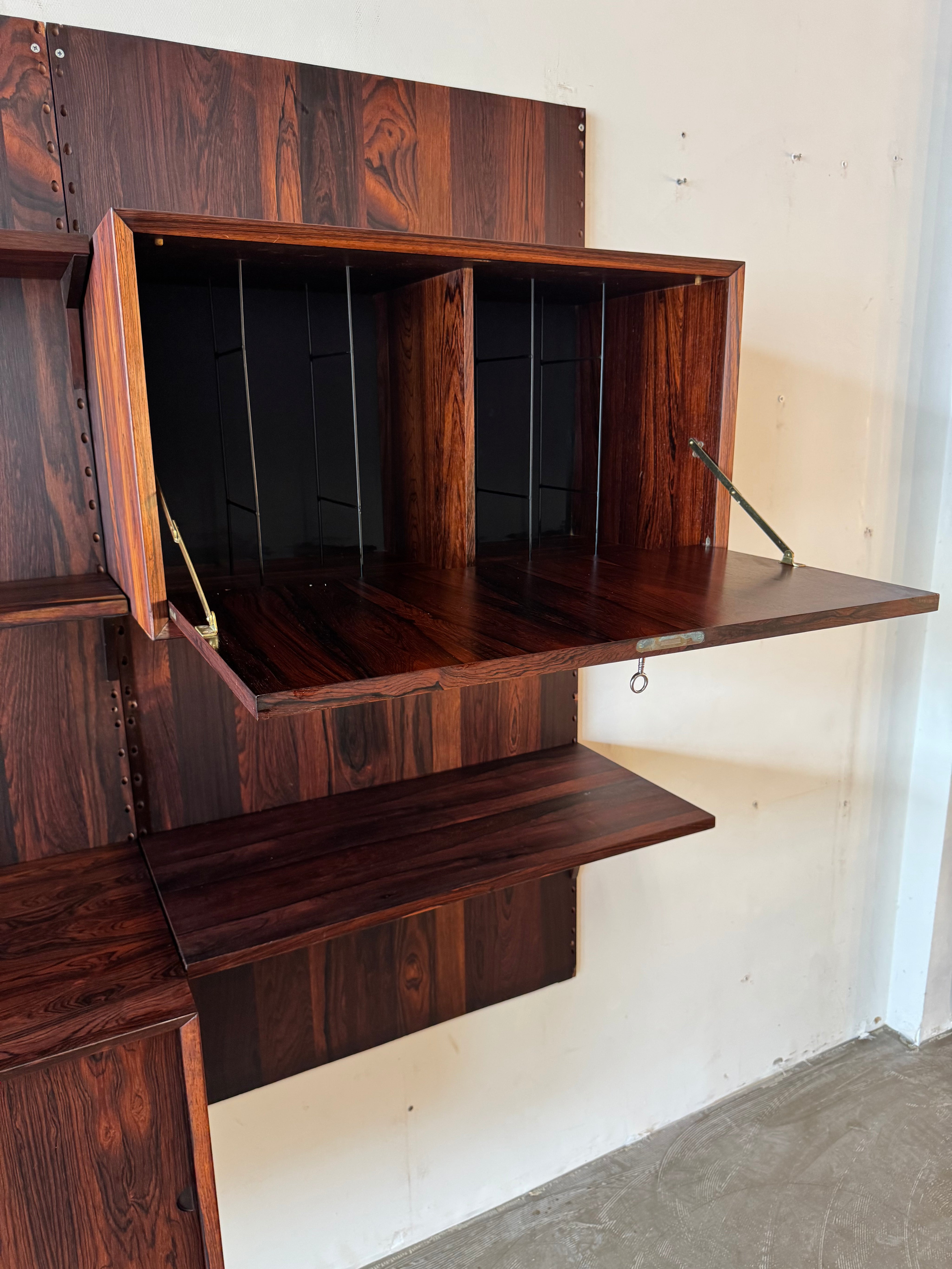 Cado_Rosewood_Wall_System_by_Poul_Cadovius,_Denmark,_1960s
