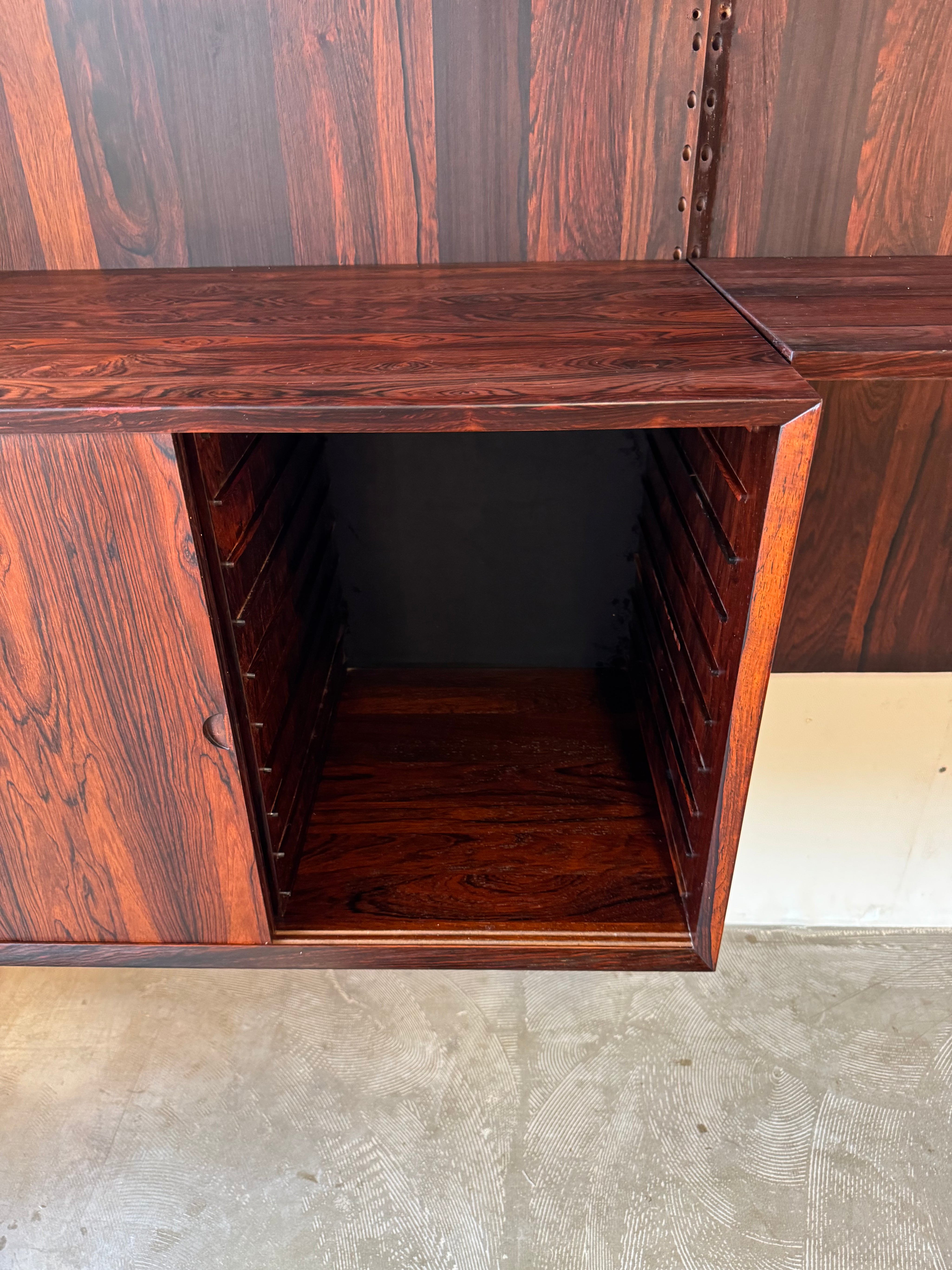 Cado_Rosewood_Wall_System_by_Poul_Cadovius,_Denmark,_1960s