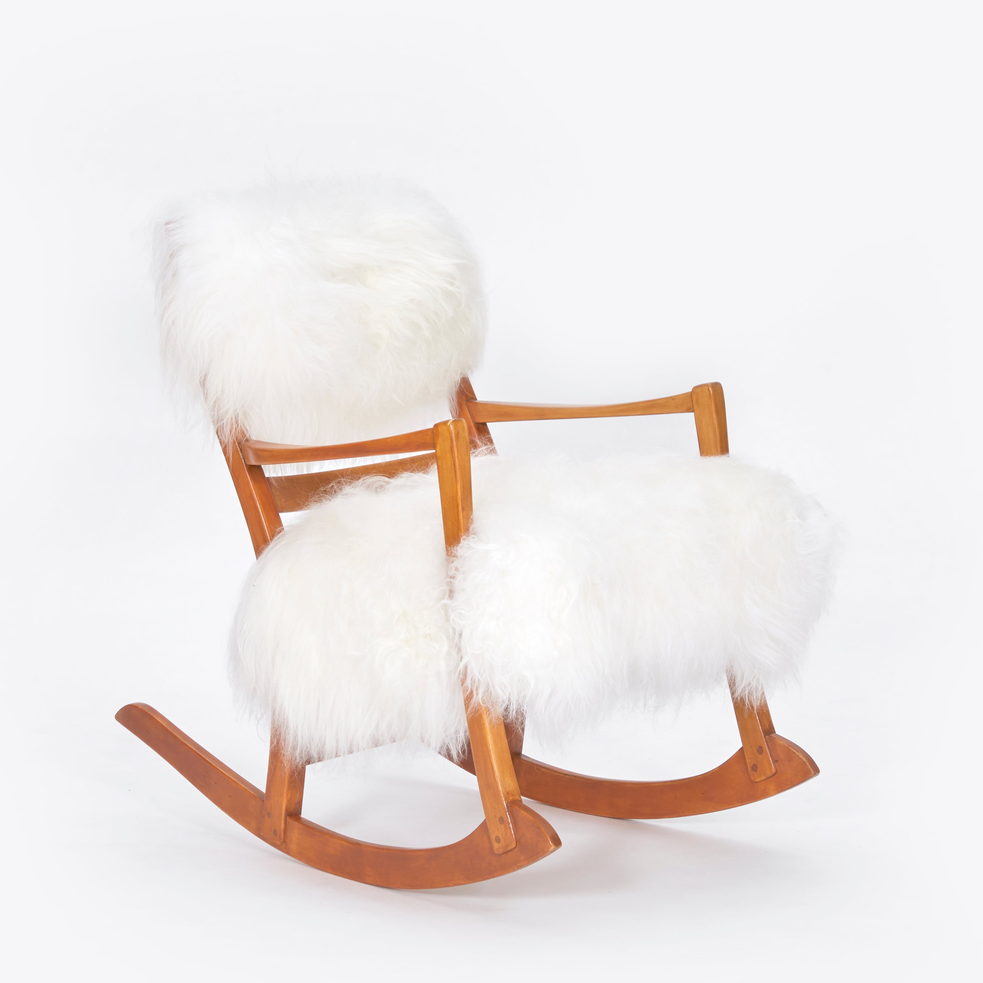 Carl_Malmsten_Rocking_Chair_in_Icelandic_Sheepskin,_1950s