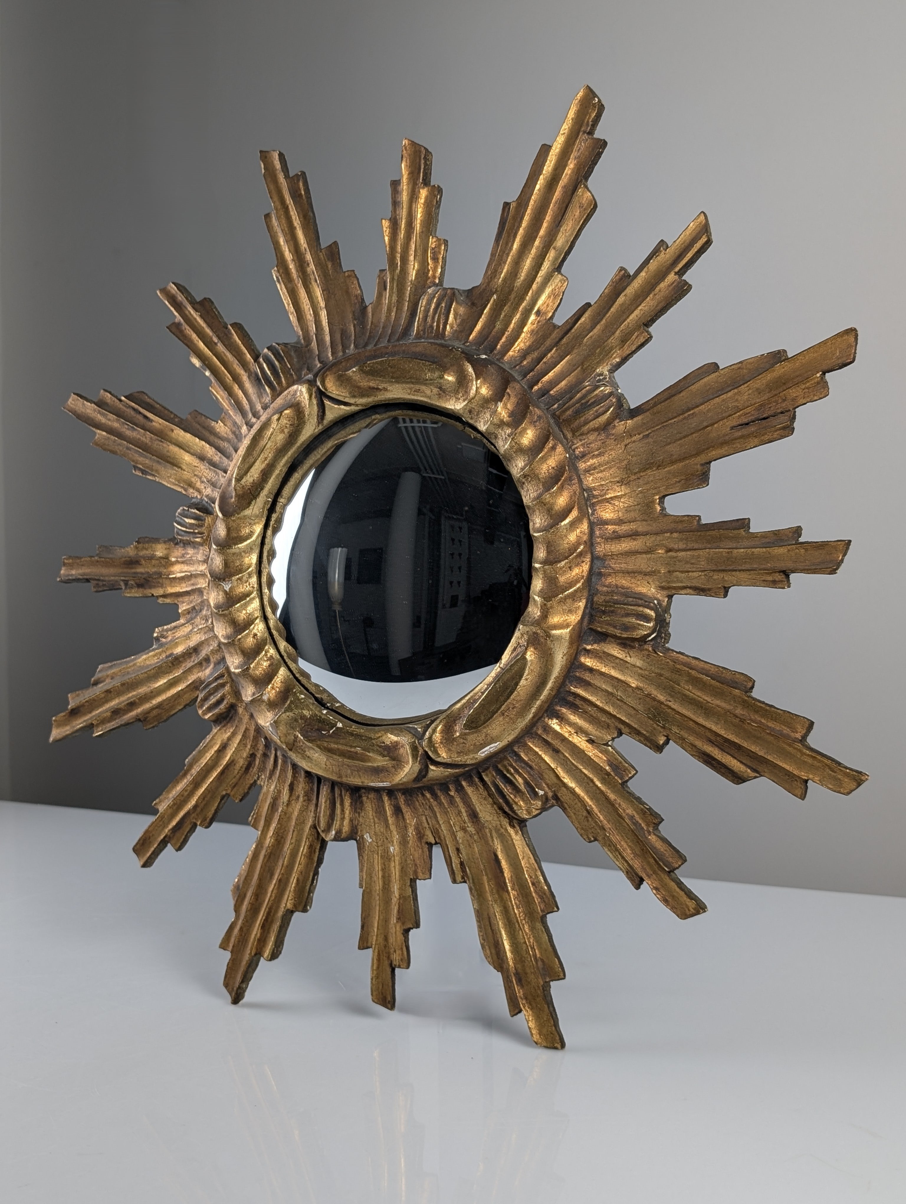 Carved_Giltwood_Sunburst_Convex_Wall_Mirror,_1950s