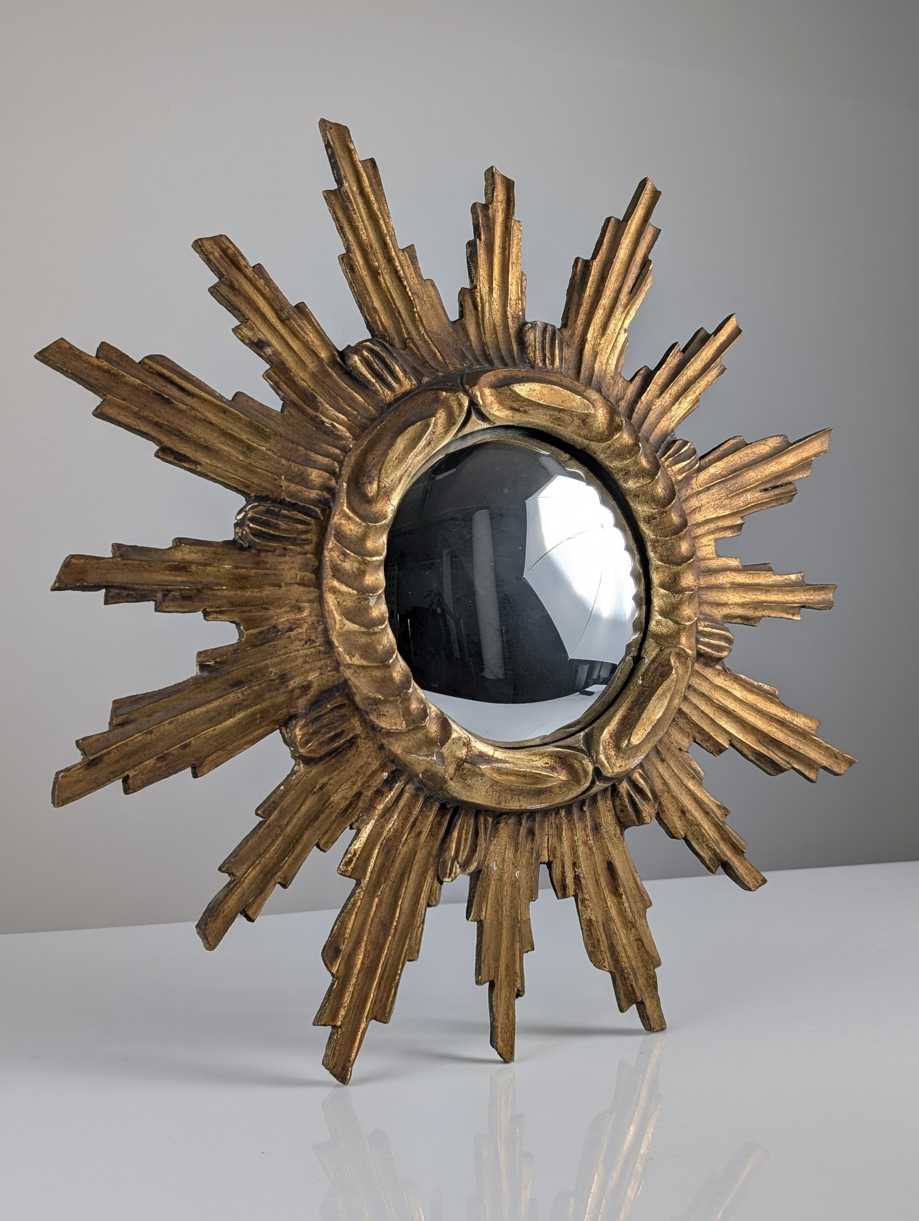 Carved_Giltwood_Sunburst_Convex_Wall_Mirror,_1950s