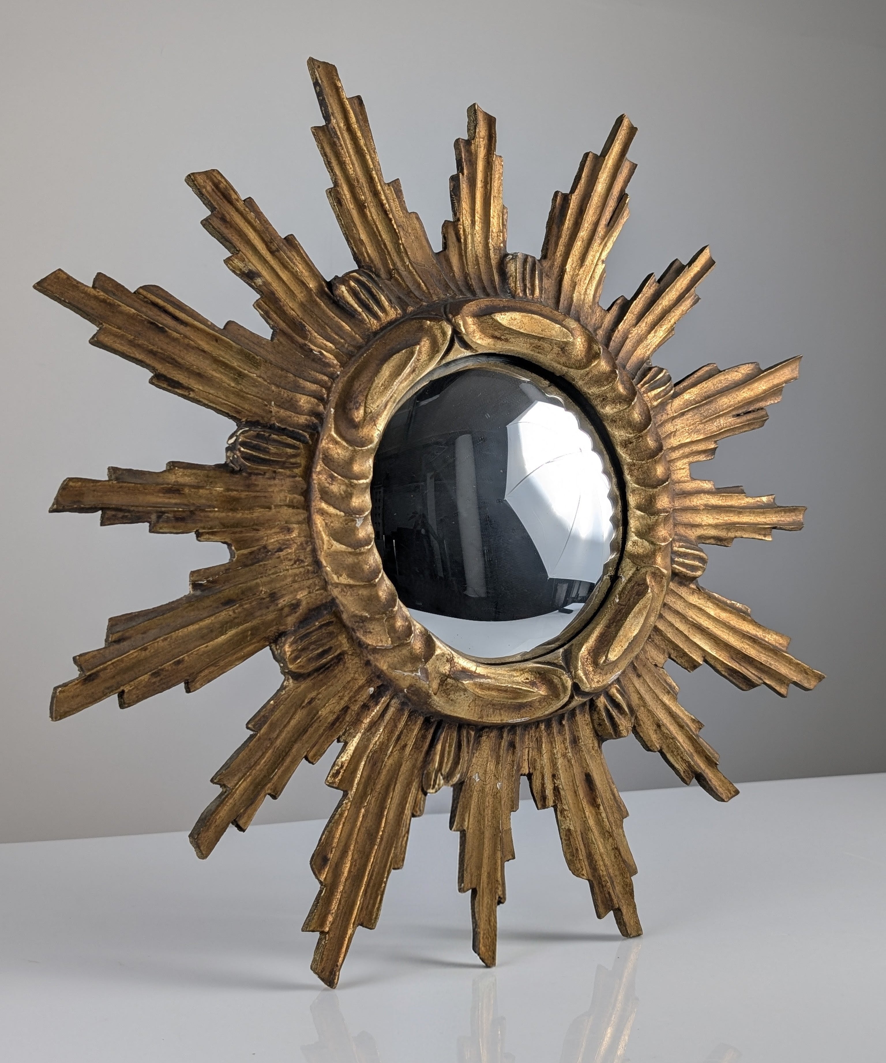 Carved_Giltwood_Sunburst_Convex_Wall_Mirror,_1950s