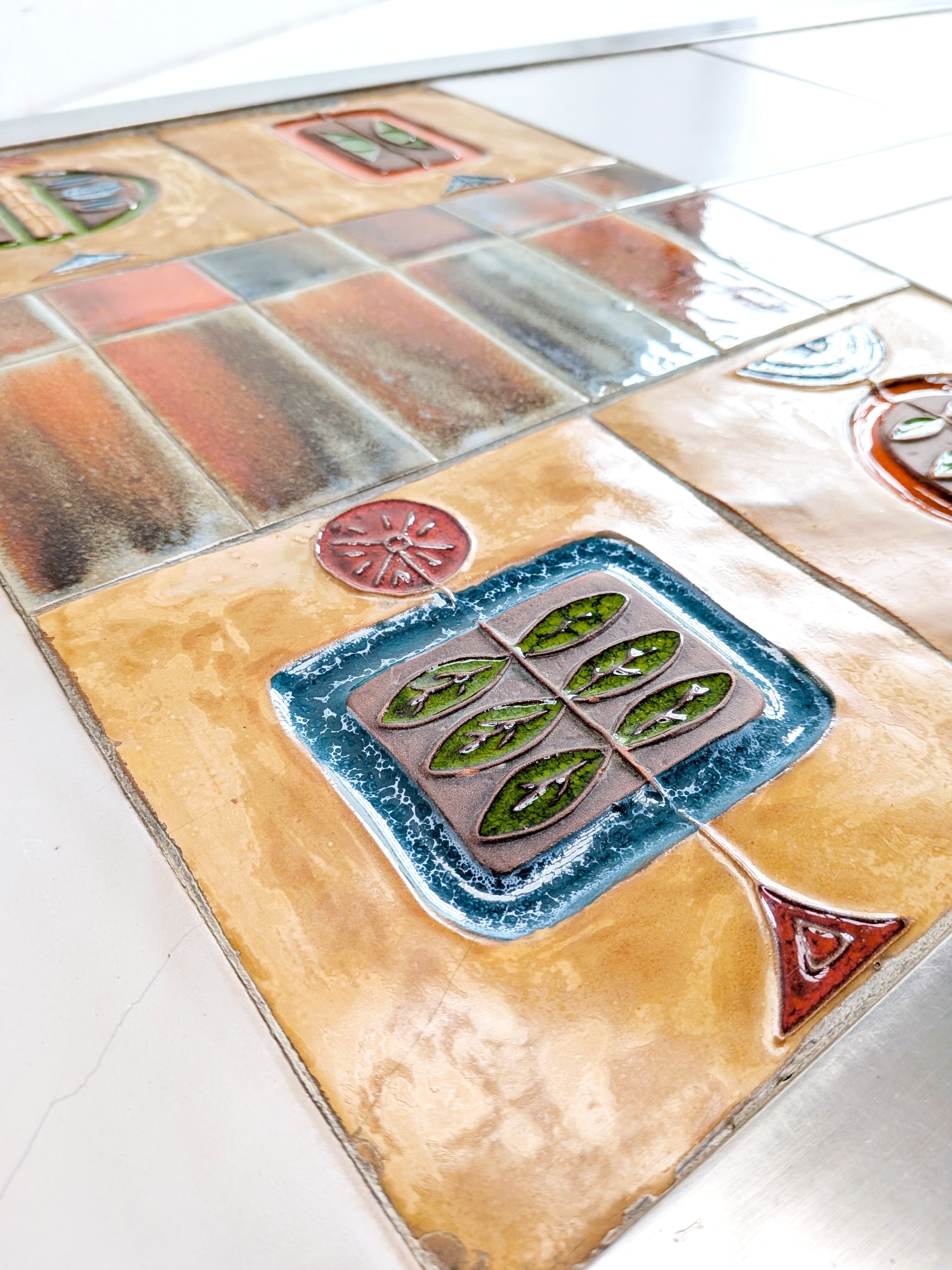 Ceramic_Tile_Coffee_Table_by_Jean_Gregorieff_for_Roche_Bobois,_1970s,_France