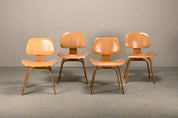 Set_of_4_Charles_&_Ray_Eames_DCW_Dining_Chairs_for_Herman_Miller,_1954