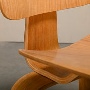 Set_of_4_Charles_&_Ray_Eames_DCW_Dining_Chairs_for_Herman_Miller,_1954