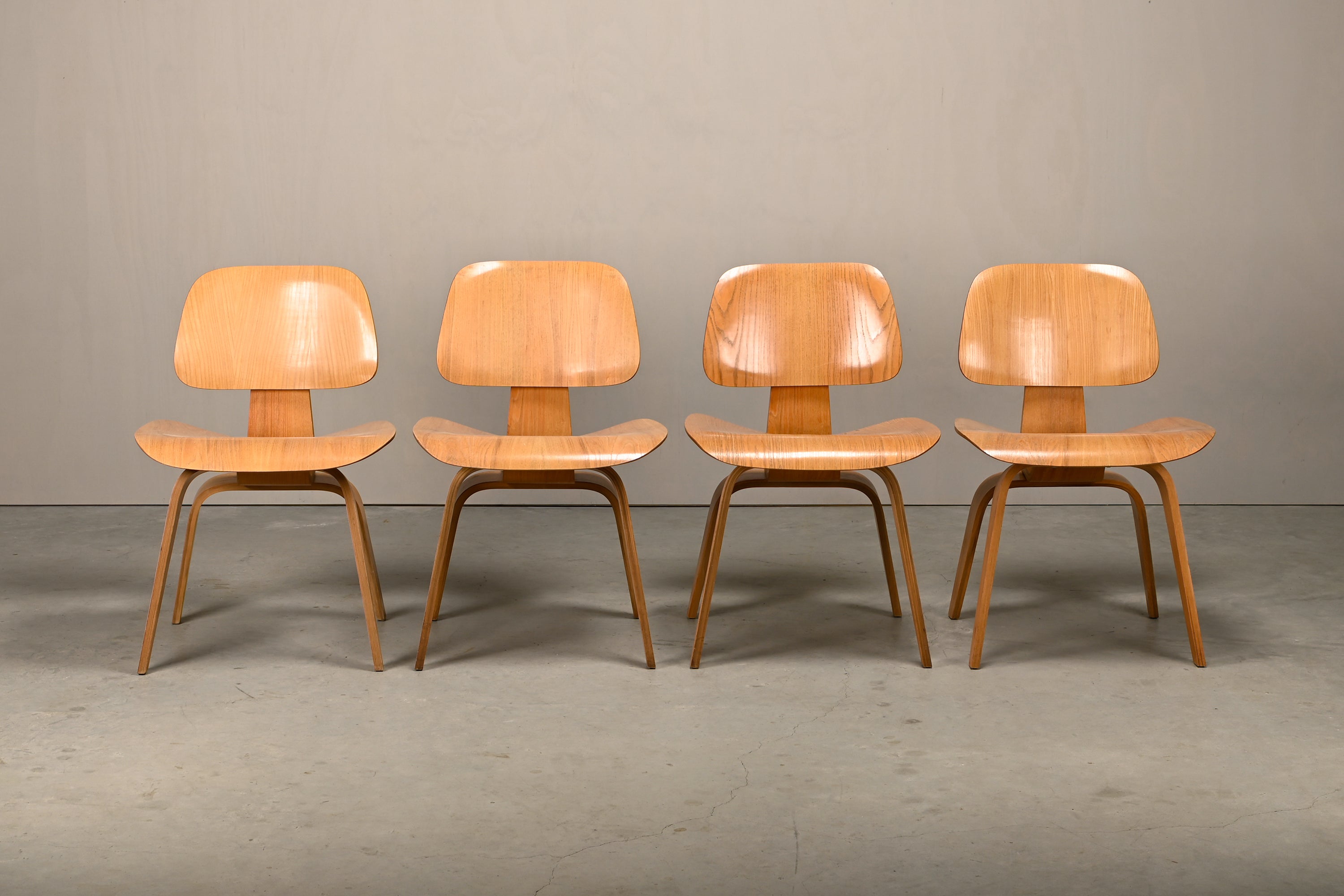 Set_of_4_Charles_&_Ray_Eames_DCW_Dining_Chairs_for_Herman_Miller,_1954