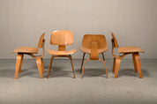 Set_of_4_Charles_&_Ray_Eames_DCW_Dining_Chairs_for_Herman_Miller,_1954