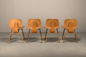 Set_of_4_Charles_&_Ray_Eames_DCW_Dining_Chairs_for_Herman_Miller,_1954