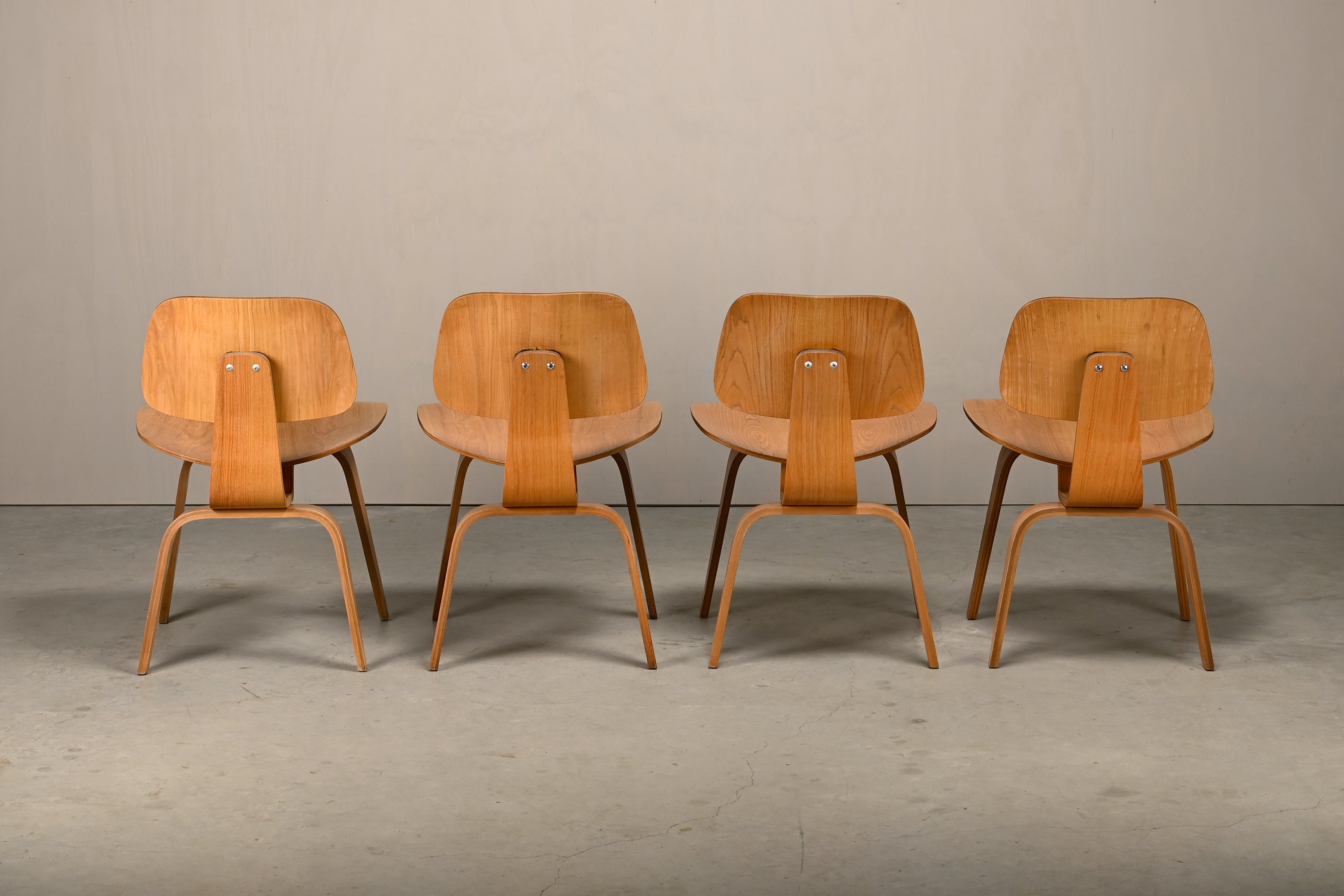 Set_of_4_Charles_&_Ray_Eames_DCW_Dining_Chairs_for_Herman_Miller,_1954