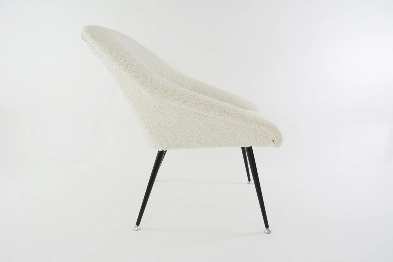 Cream_boucle_shell_armchairs_1970s