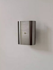 Curved_Brushed_Metal_Wall_Sconce,_France_1970s