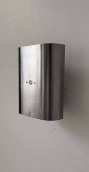 Curved_Brushed_Metal_Wall_Sconce,_France_1970s