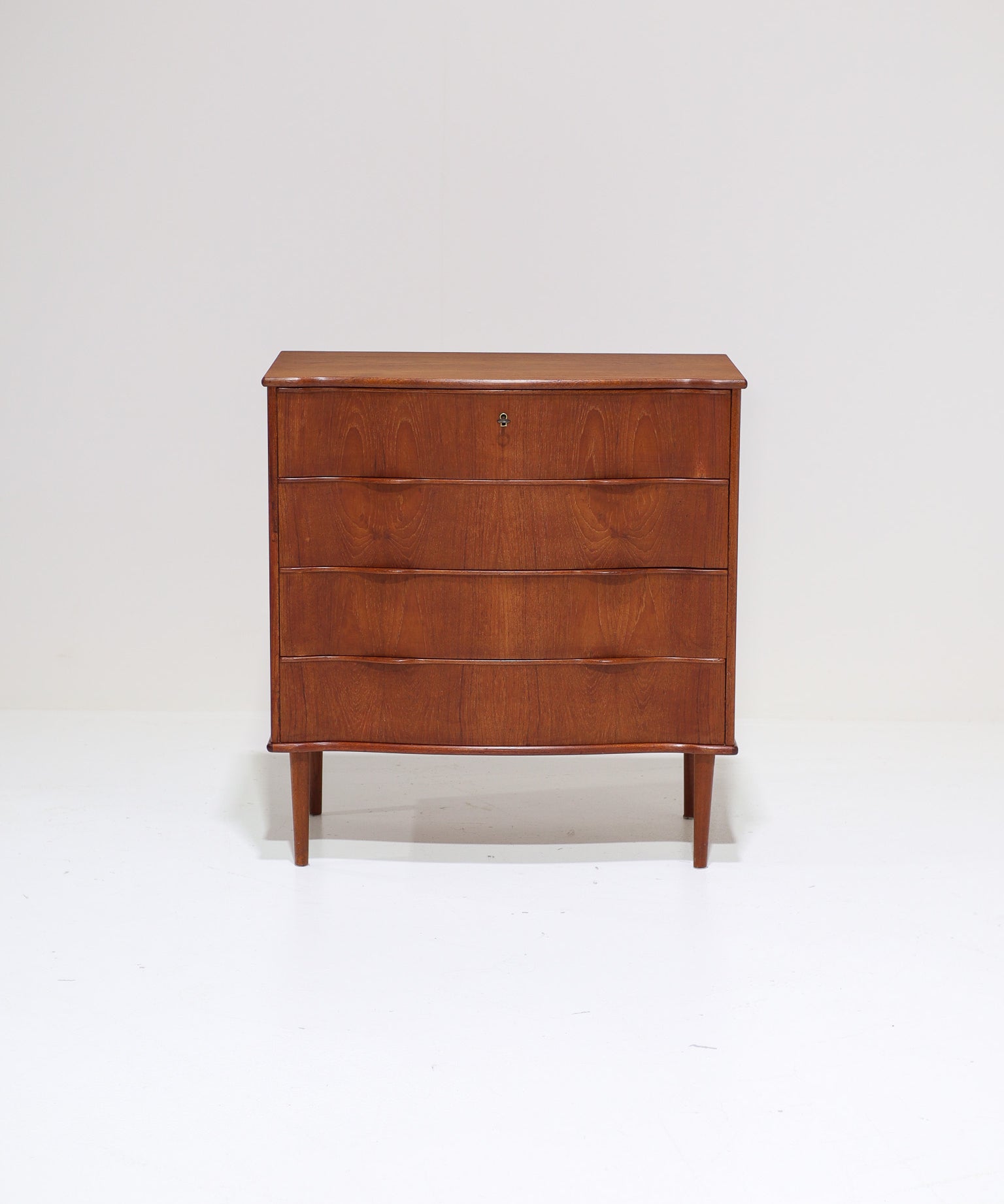 Danish_Teak_Chest_of_Drawers_with_Curved_Front,_1960s