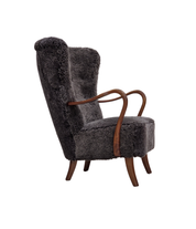 Danish_Mid-Century_Modern_Armchair_in_Genuine_Sheepskin,_Teak_and_Brass,_Denmark,_1960s