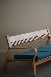 Danish_Modern_GE_671_Three-Seater_Sofa_by_Hans_J._Wegner_for_GETAMA,_1960s