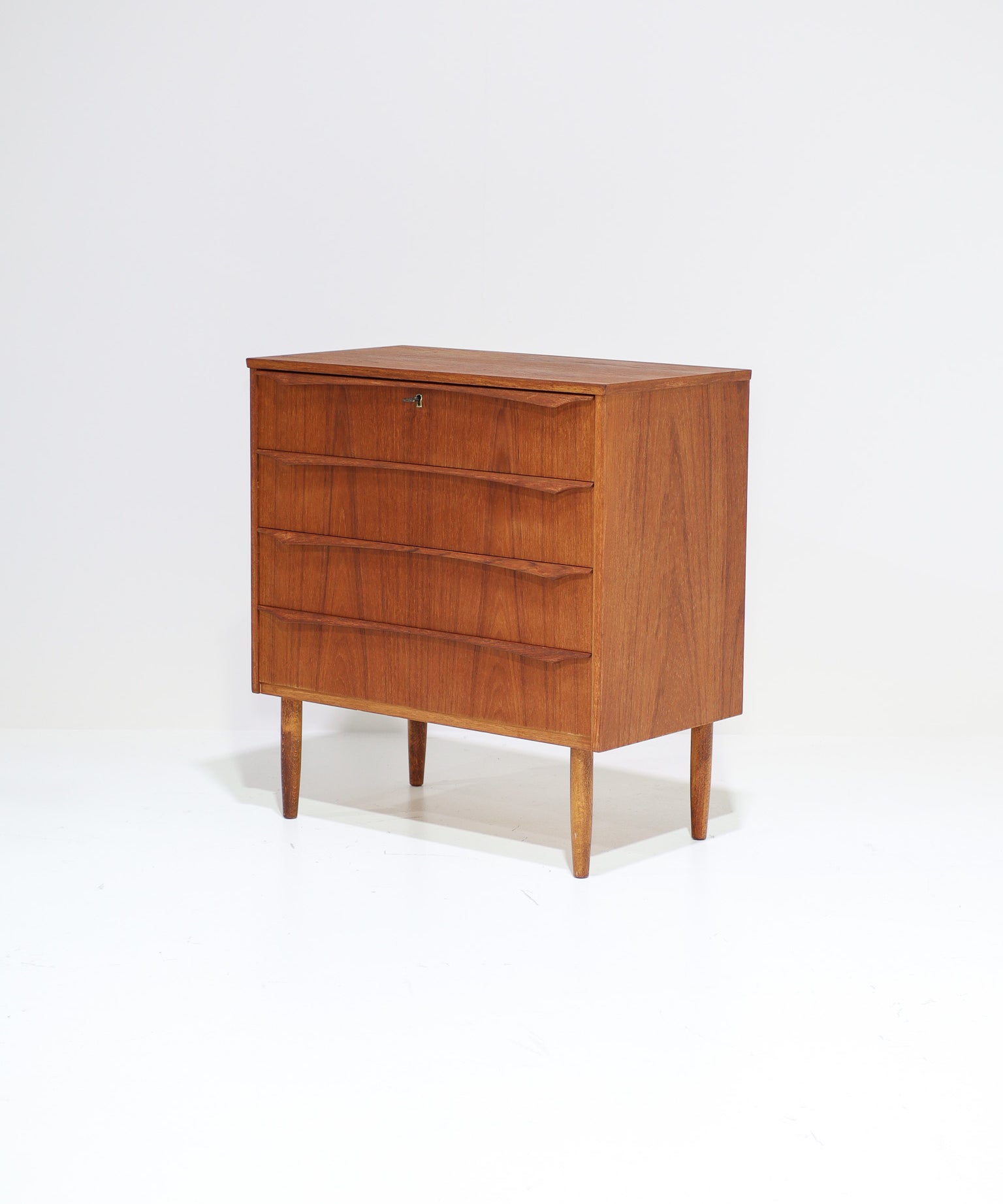 Danish_teak_chest_of_drawers,_vintage_1960s