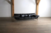 Diesis_three_seater_sofa_in_black_leather_by_Antonio_Citterio_for_B&B_Italia,_1970s