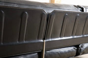Diesis_three_seater_sofa_in_black_leather_by_Antonio_Citterio_for_B&B_Italia,_1970s