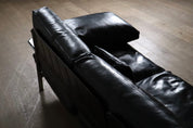 Diesis_three_seater_sofa_in_black_leather_by_Antonio_Citterio_for_B&B_Italia,_1970s
