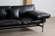 Diesis_three_seater_sofa_in_black_leather_by_Antonio_Citterio_for_B&B_Italia,_1970s