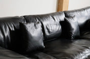 Diesis_three_seater_sofa_in_black_leather_by_Antonio_Citterio_for_B&B_Italia,_1970s