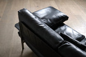 Diesis_three_seater_sofa_in_black_leather_by_Antonio_Citterio_for_B&B_Italia,_1970s