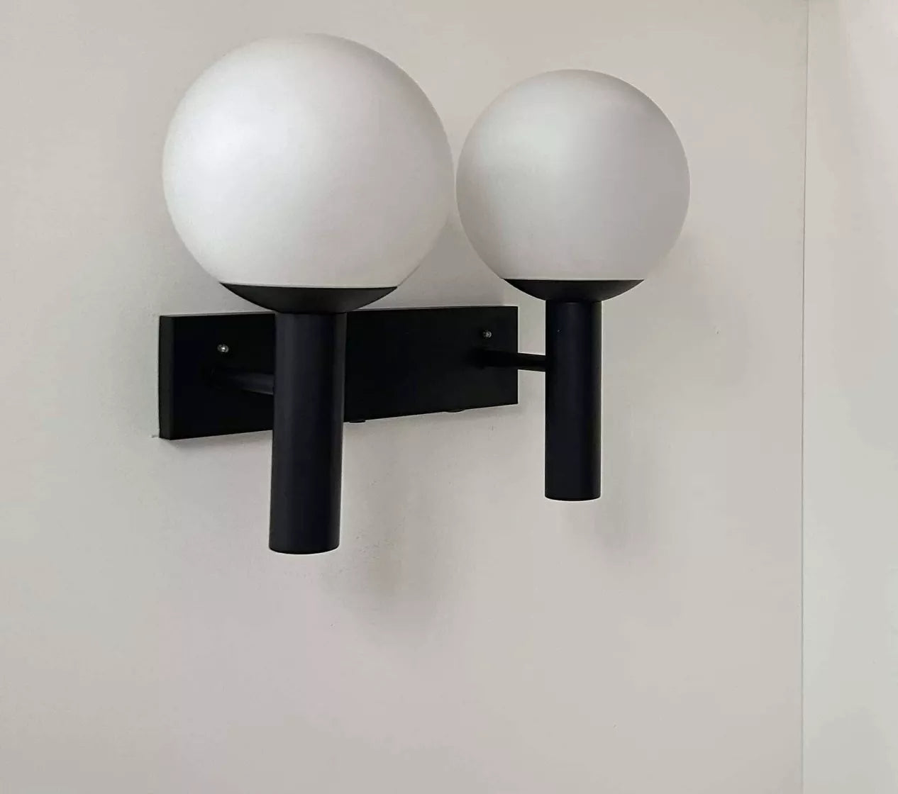 Double_Wall_Lamp_by_Raak,_Opaline_Glass_&_Black_Metal,_Mid_Century_Modern,_Netherlands_1960s