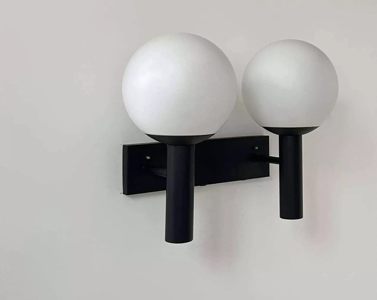Double_Wall_Lamp_by_Raak,_Opaline_Glass_&_Black_Metal,_Mid_Century_Modern,_Netherlands_1960s