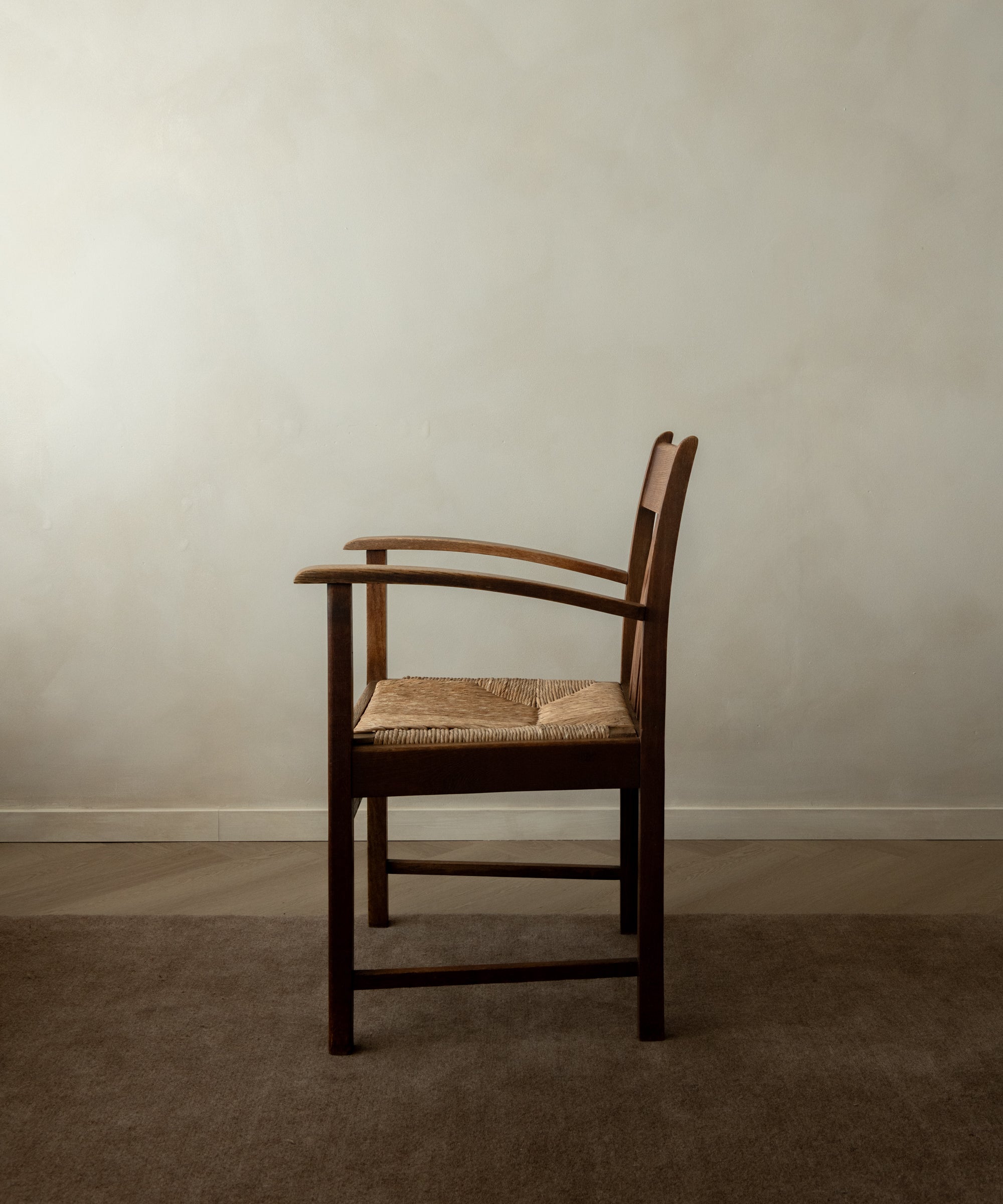 Dutch_Art_Deco_Oak_Armchair_with_Woven_Rush_Seat,_Amsterdam_School_Style,_Netherlands,_1920s
