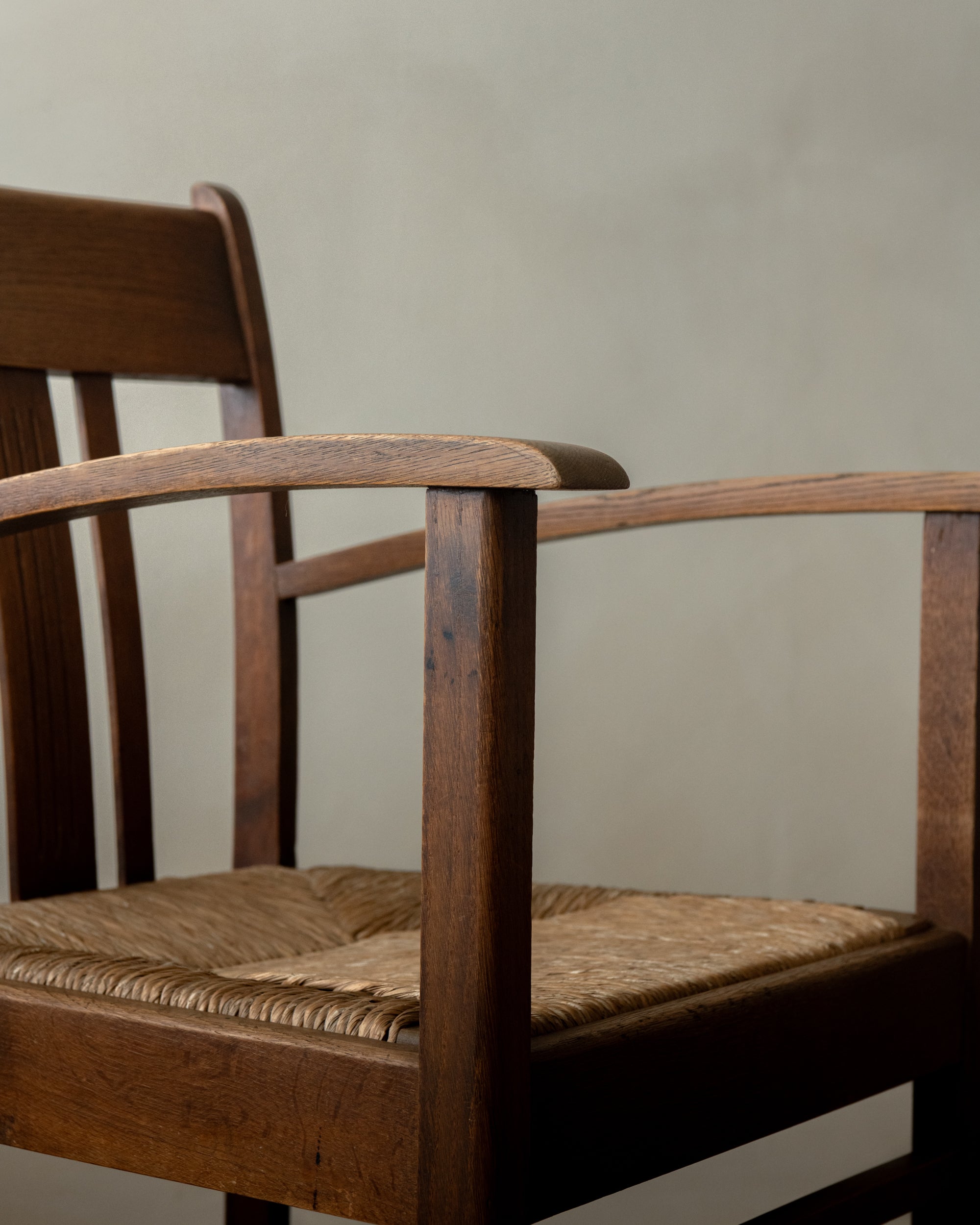 Dutch_Art_Deco_Oak_Armchair_with_Woven_Rush_Seat,_Amsterdam_School_Style,_Netherlands,_1920s