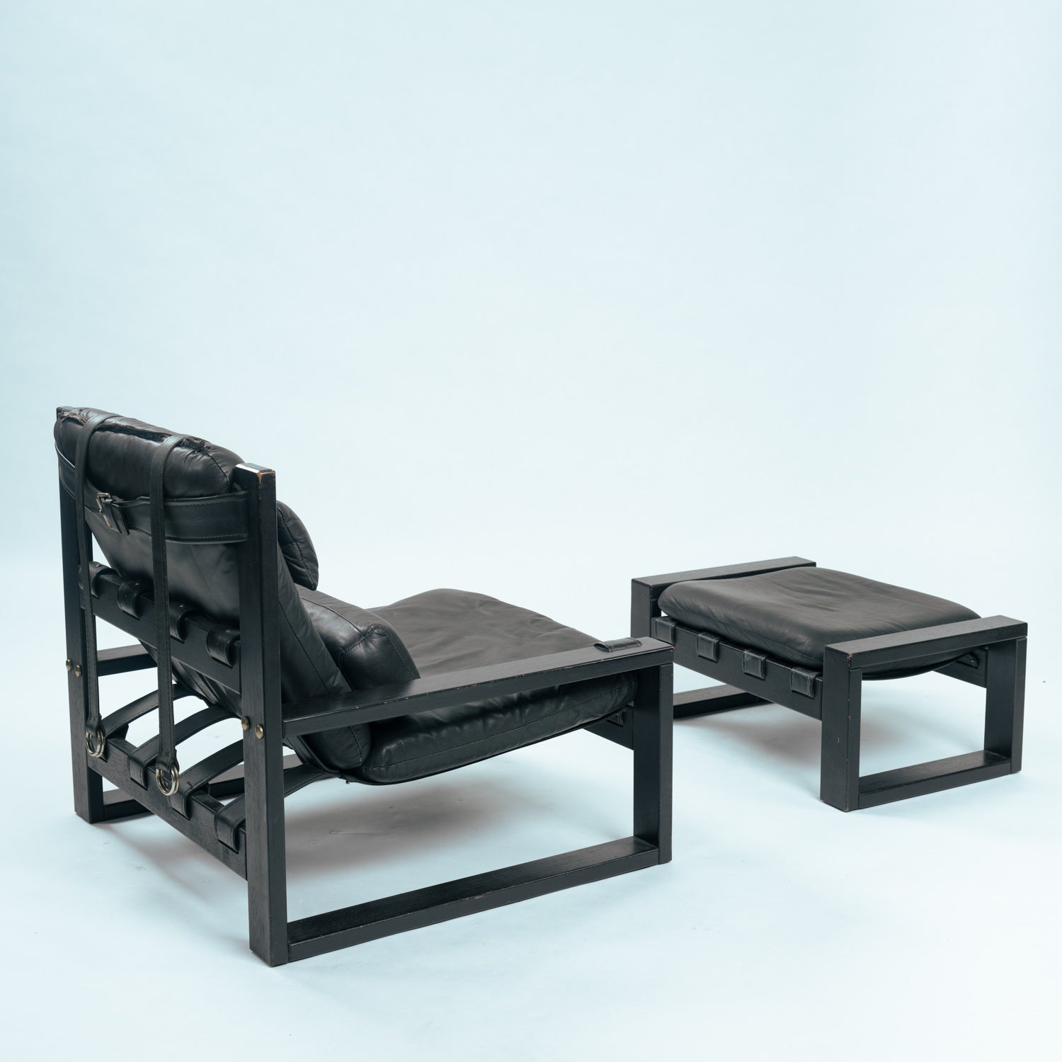 Set_of_Sonja_Wasseur_Black_Leather_Lounge_Chair_and_Ottoman,_Netherlands_1974