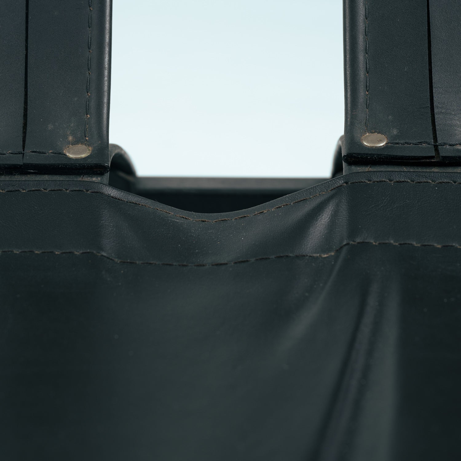Set_of_Sonja_Wasseur_Black_Leather_Lounge_Chair_and_Ottoman,_Netherlands_1974