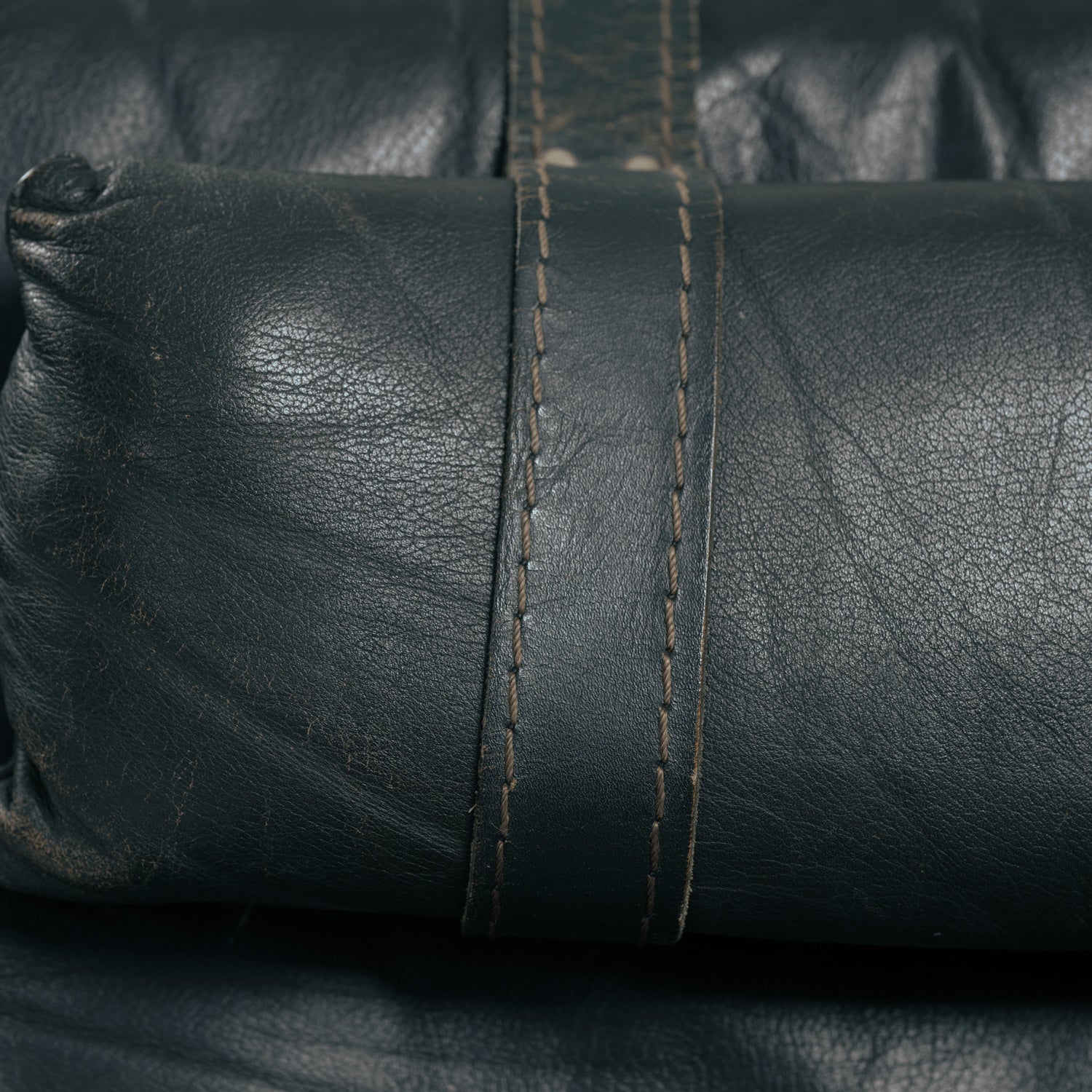 Set_of_Sonja_Wasseur_Black_Leather_Lounge_Chair_and_Ottoman,_Netherlands_1974