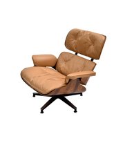 Eames_Lounge_Chair_and_Ottoman_by_Charles_&_Ray_Eames_for_Herman_Miller,_Rosewood_&_Butterscotch_Leather,_1960s