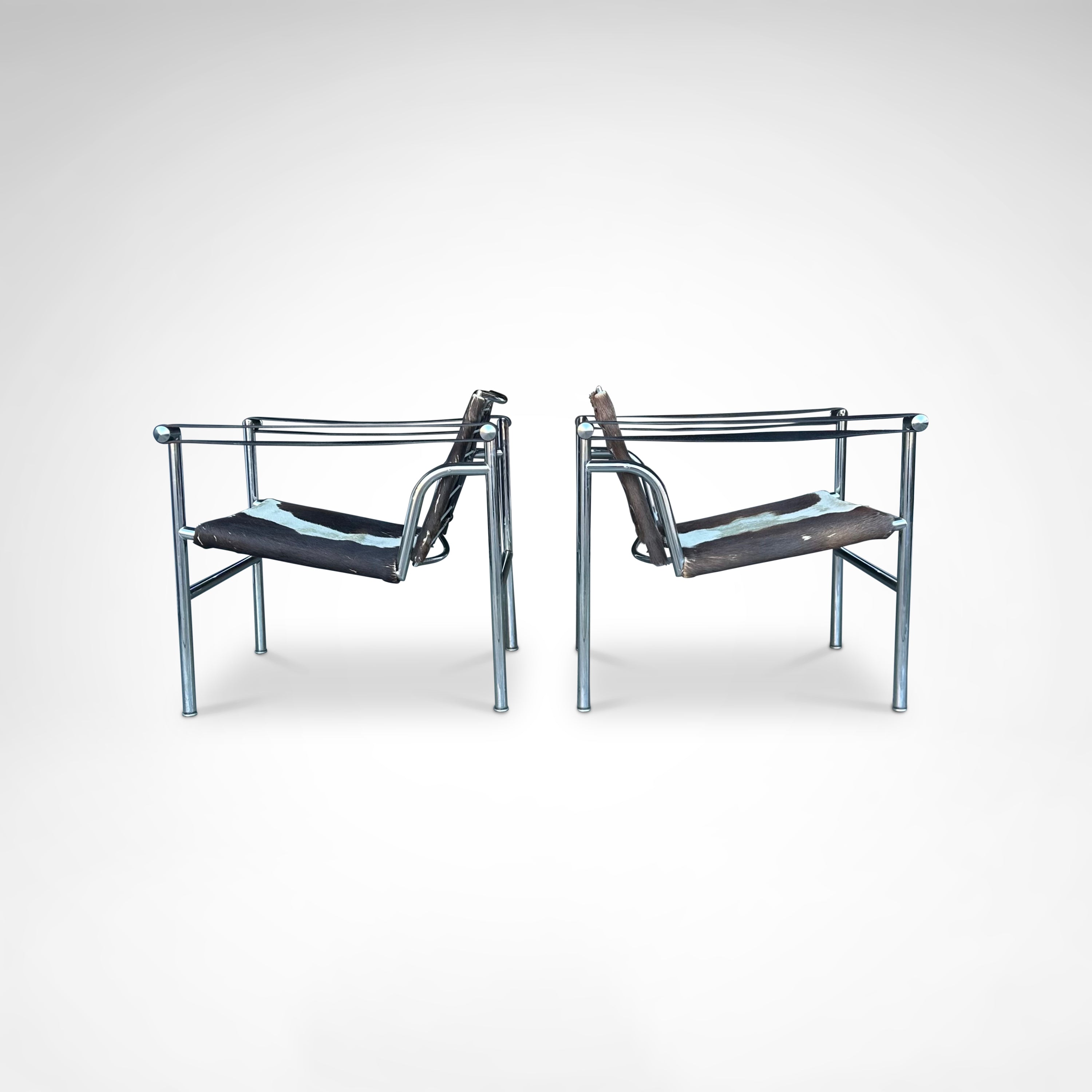 Set_of_2_LC1_Basculant_Chairs_by_Le_Corbusier_for_Cassina,_1970s,_Italy