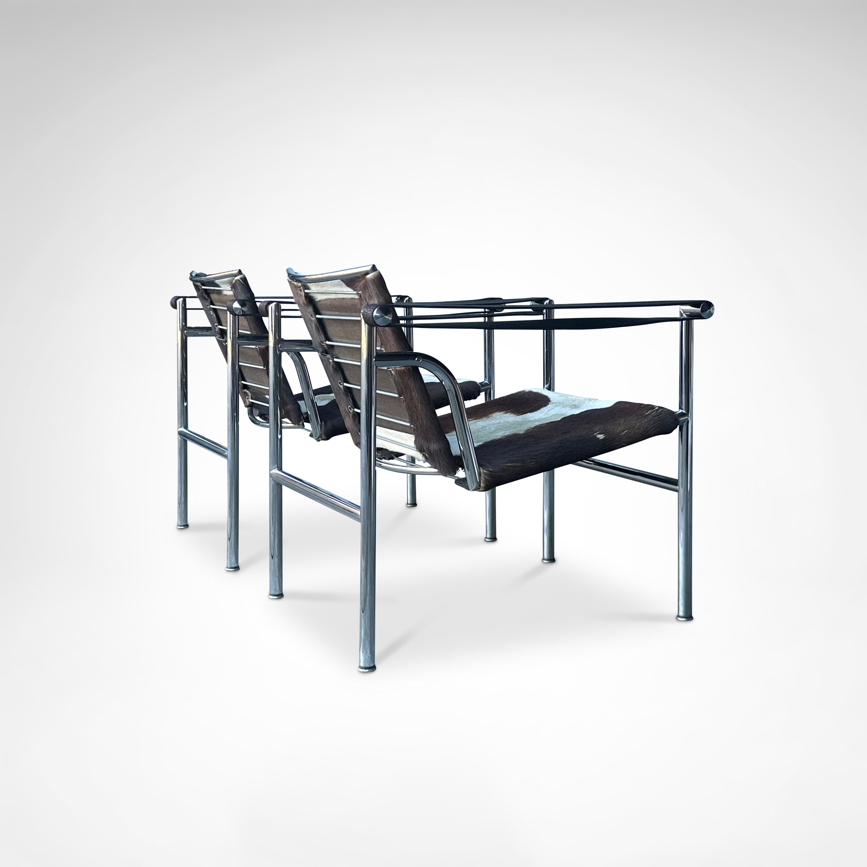 Set_of_2_LC1_Basculant_Chairs_by_Le_Corbusier_for_Cassina,_1970s,_Italy