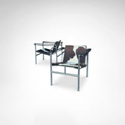 Set_of_2_LC1_Basculant_Chairs_by_Le_Corbusier_for_Cassina,_1970s,_Italy