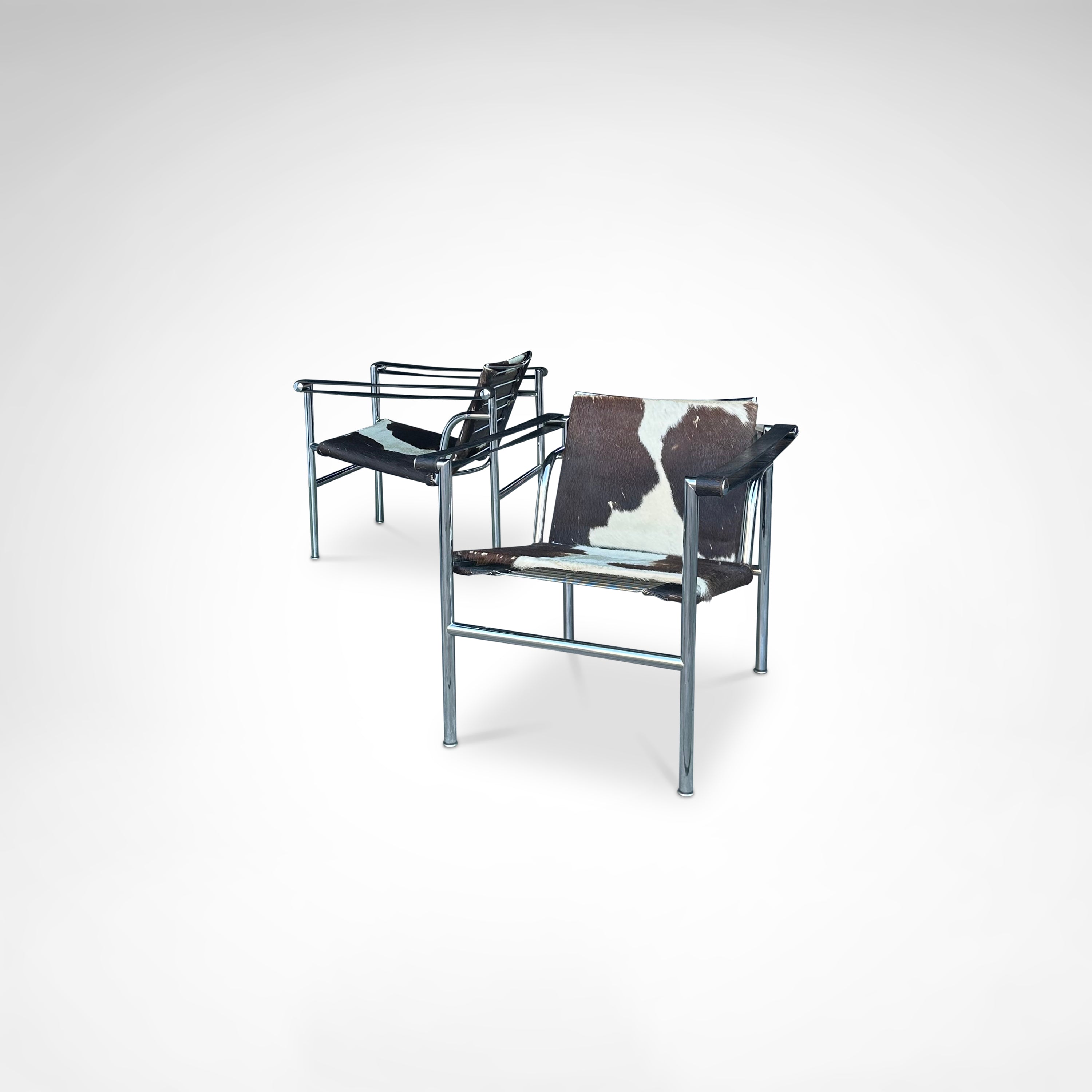 Set_of_2_LC1_Basculant_Chairs_by_Le_Corbusier_for_Cassina,_1970s,_Italy