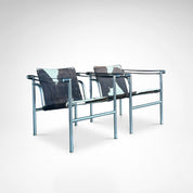 Set_of_2_LC1_Basculant_Chairs_by_Le_Corbusier_for_Cassina,_1970s,_Italy