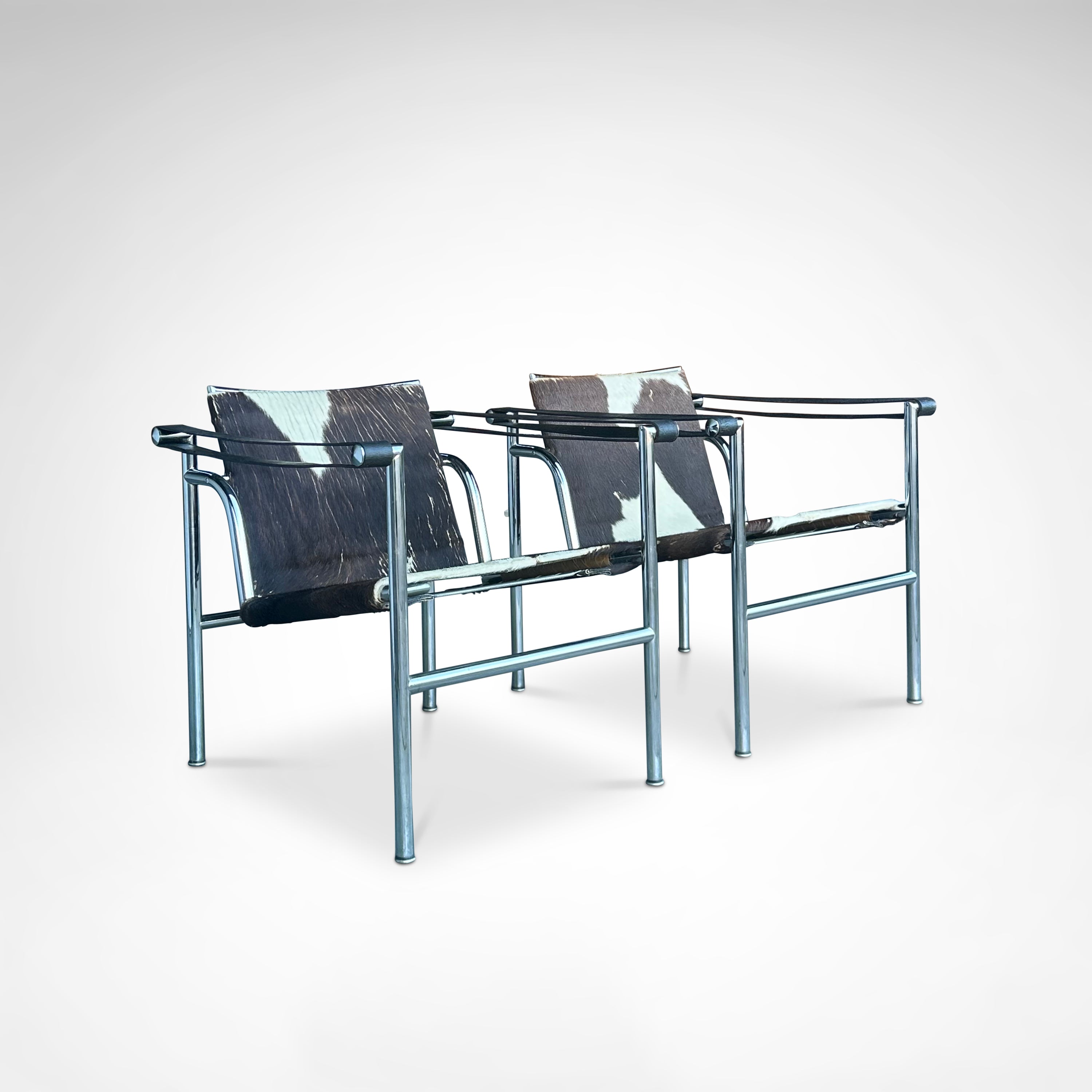 Set_of_2_LC1_Basculant_Chairs_by_Le_Corbusier_for_Cassina,_1970s,_Italy