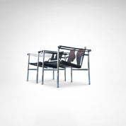 Set_of_2_LC1_Basculant_Chairs_by_Le_Corbusier_for_Cassina,_1970s,_Italy