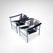 Set_of_2_LC1_Basculant_Chairs_by_Le_Corbusier_for_Cassina,_1970s,_Italy
