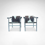 Set_of_2_LC1_Basculant_Chairs_by_Le_Corbusier_for_Cassina,_1970s,_Italy